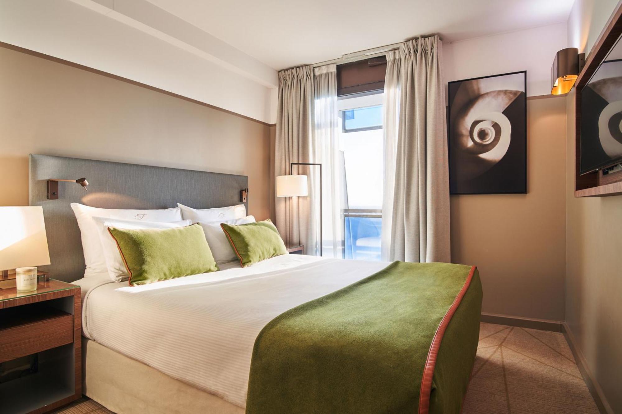 Fraser Suites Paris La Defense Courbevoie Ngoại thất bức ảnh A bedroom at the hotel